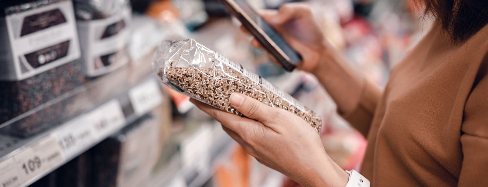 Woman checking food packaging