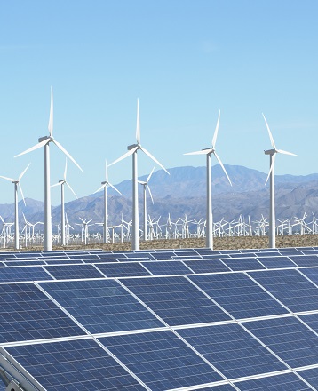 Photovoltaic solar panels and wind turbines, San Gorgonio Pass Wind Farm, Palm Springs, California, USA.