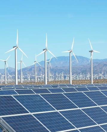 Photovoltaic solar panels and wind turbines, San Gorgonio Pass Wind Farm, Palm Springs, California, USA.