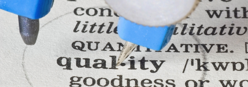 Lähikuva lehdestä jossa lukee quality